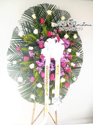 corona fúnebre rosa